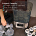 Baby Brezza Super Fast Sterilizer and Dryer with baby bottles and accessories on a kitchen counter.