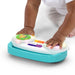 Baby Einstein Toddler Jams Musical Toy played by a baby on a white surface