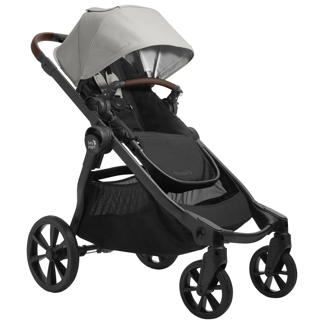 Baby Jogger City Select 2 Eco Frosted Ivory stroller shown in side view with canopy extended.