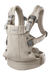BabyBjorn Baby Carrier Harmony in beige shown upright on a plain background.