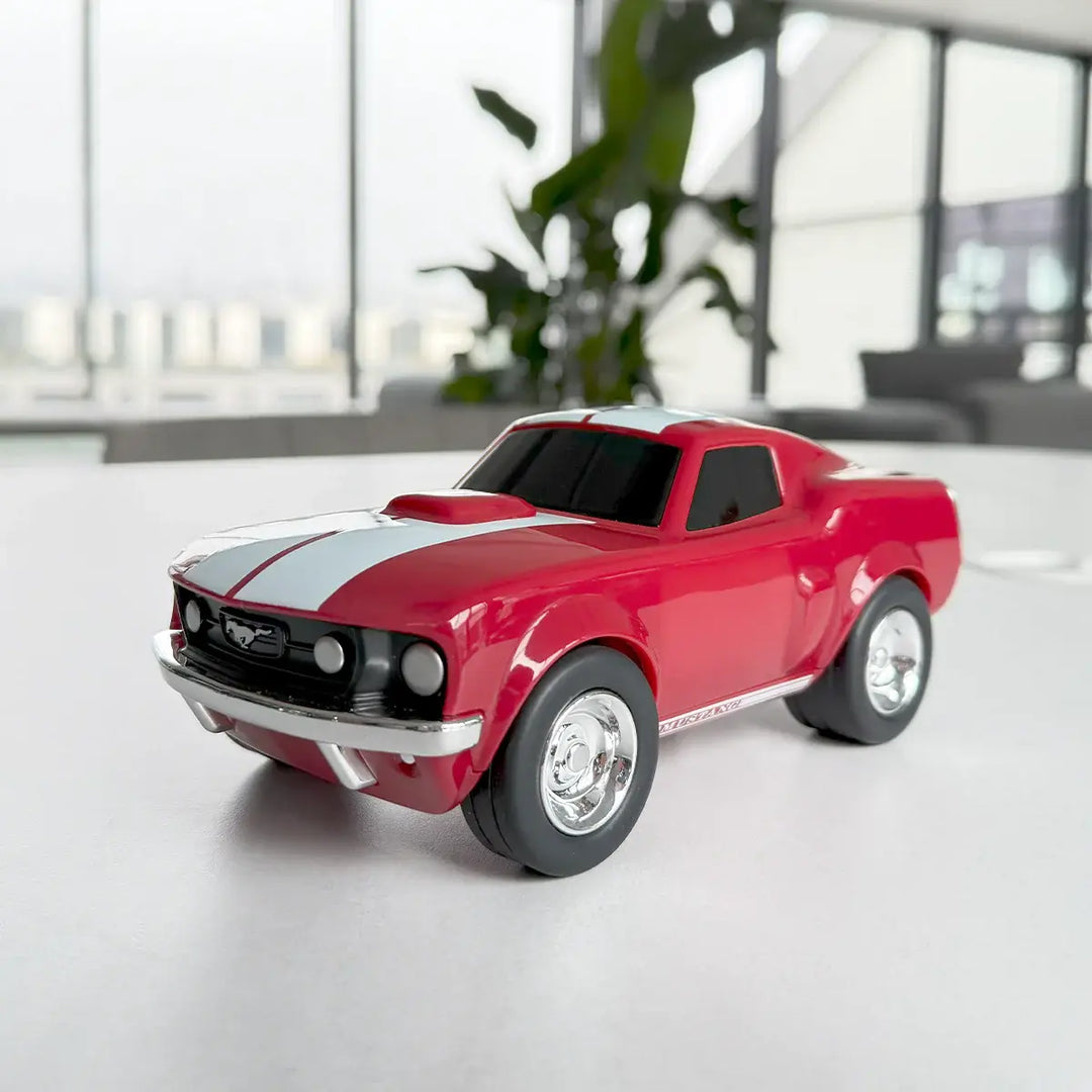 Baghera Ford Mustang Racing Car in red displayed on a white indoor tabletop.