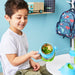 Bbox insulated food jar 335ml Ocean Breeze held by a child at a small table with pasta inside.