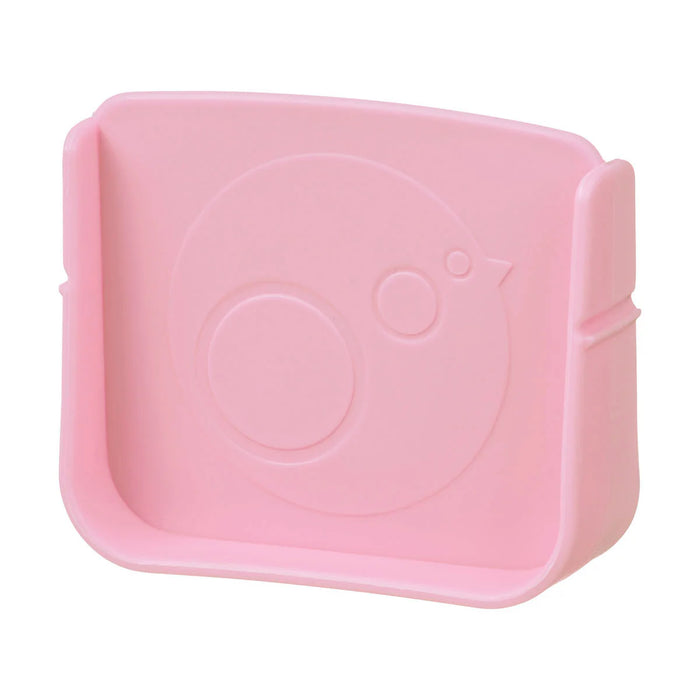 Bbox lunchbox Flamingo Fizz shown in close-up, pastel pink with embossed bird design, on white background.