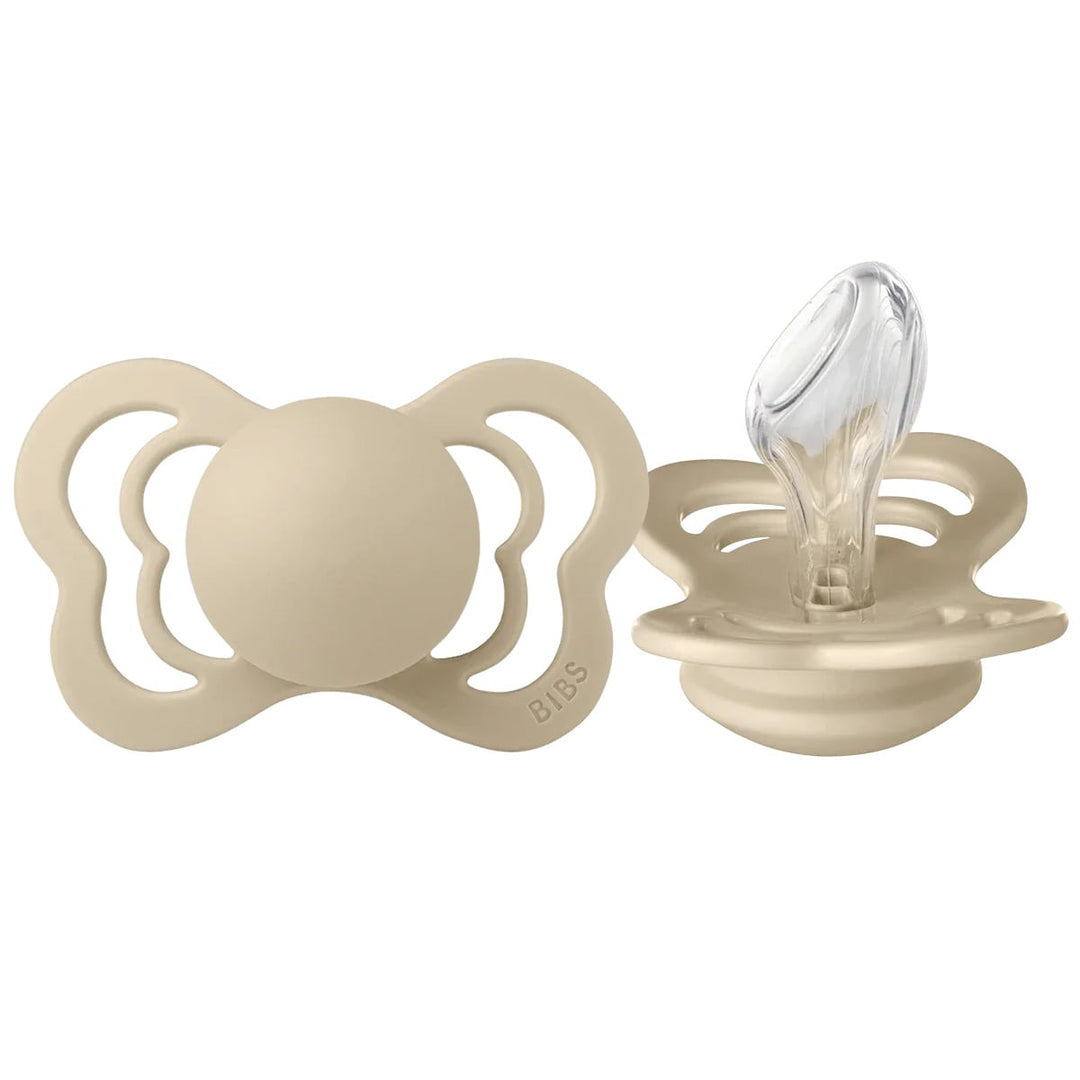 vanilla silicone anatomical baby pacifier with butterfly-shaped shield, two angles shown