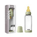 BIBS glass baby bottle with sage green cap shown next to packaging box and bottle cover.