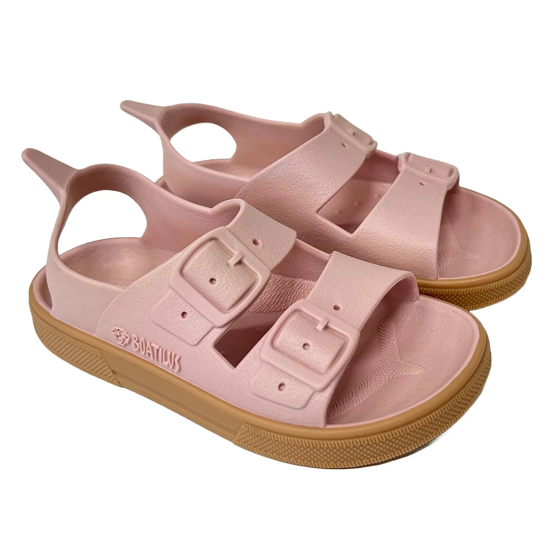 Boatilus Irkyverg pink kids’ sandals with double buckle straps shown on a white background.