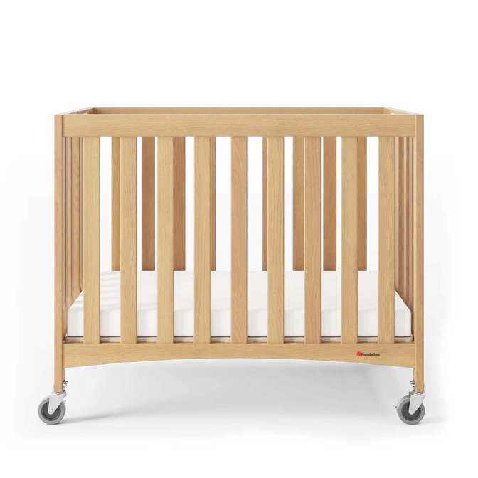 Foundations® Travel Sleeper™ Folding Mini Crib – Compact Commercial Infant Crib
