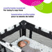 Cosco Funsport Playard with mesh sides, shown with a baby sleeping inside on a star-patterned mattress.