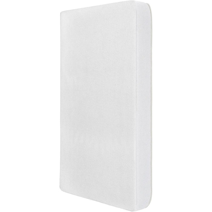 Dom Little Baby 6 Inch Firm Fiber Crib Mattress standing upright on a white background.
