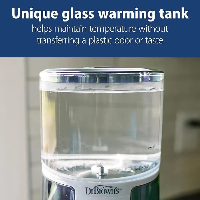 Dr. Brown's Insta-Prep warm water dispenser with glass tank shown on a kitchen counter.