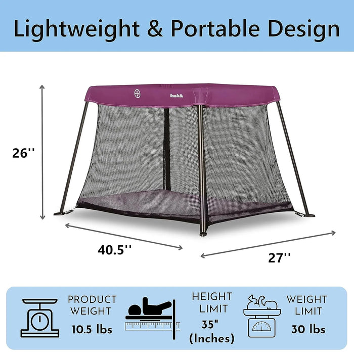 Dream On Me Travel Light pink playard shown fully assembled with size dimensions and mesh sides.