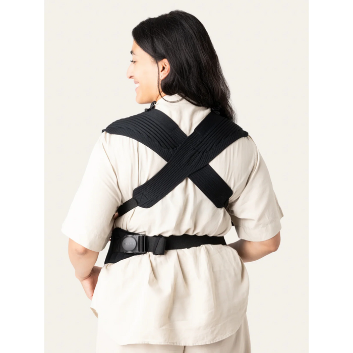 Flybaby 3D Baby Carrier shown on a person from the back, displaying cross-strap design.