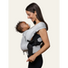 Flybaby 3D Baby Carrier in light grey, shown with baby facing parent in soft fabric support.