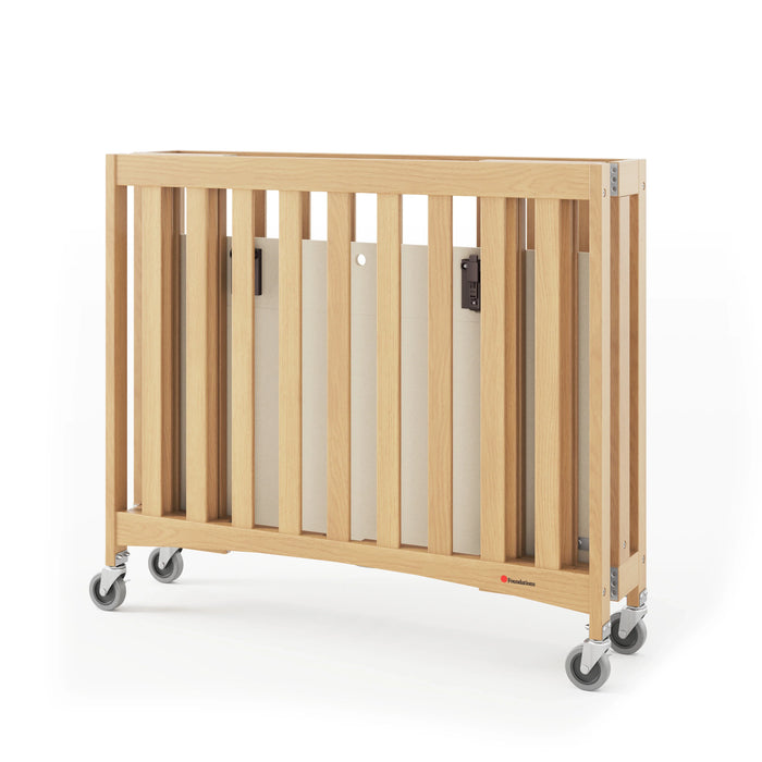 Foundations® - Foundations Travel Sleeper® Compact HideAway™ EasyRoll™ Solid Wood Folding Crib, Slatted with Oversized Casters (Including Foam Mattress)