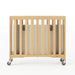 Foundations® - Foundations Travel Sleeper® Compact HideAway™ EasyRoll™ Solid Wood Folding Crib, Slatted with Oversized Casters (Including Foam Mattress)