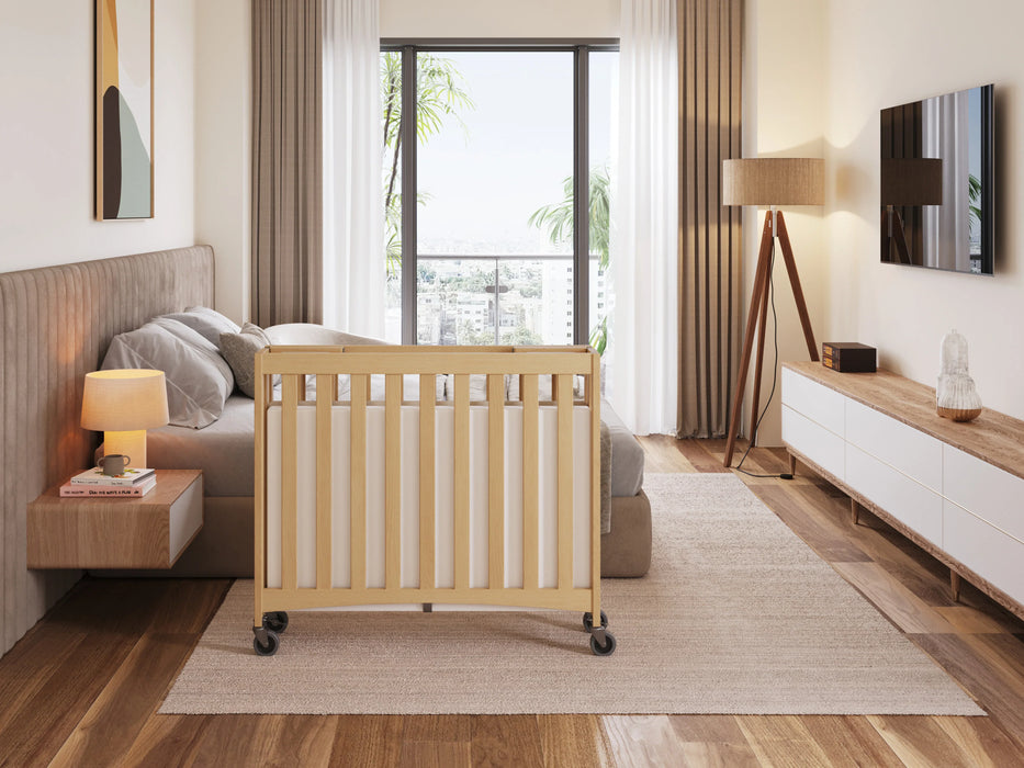 Foundations® - Foundations Travel Sleeper® Compact HideAway™ EasyRoll™ Solid Wood Folding Crib, Slatted with Oversized Casters (Including Foam Mattress)
