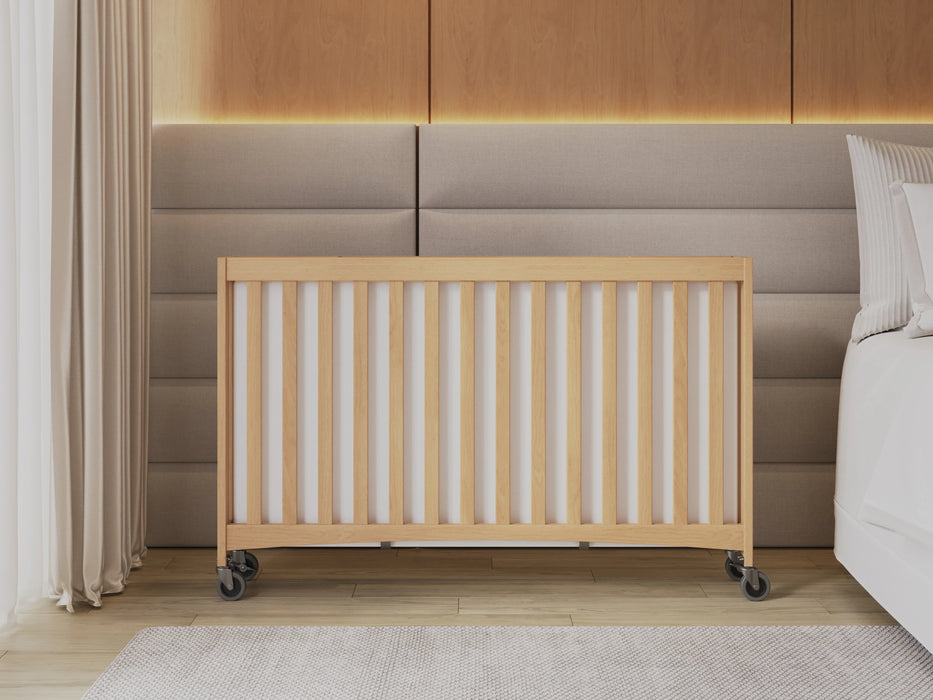 Foundations® - Travel Sleeper® Full-Size Folding Crib with Oversized Casters (Including Foam Mattress)