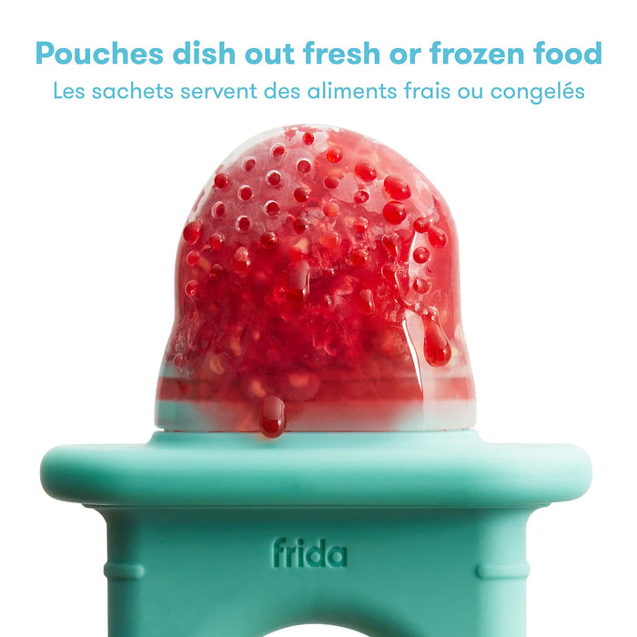 Frida Baby Push Pop Feeder with fresh fruit, close-up of silicone pouch and teal handle.