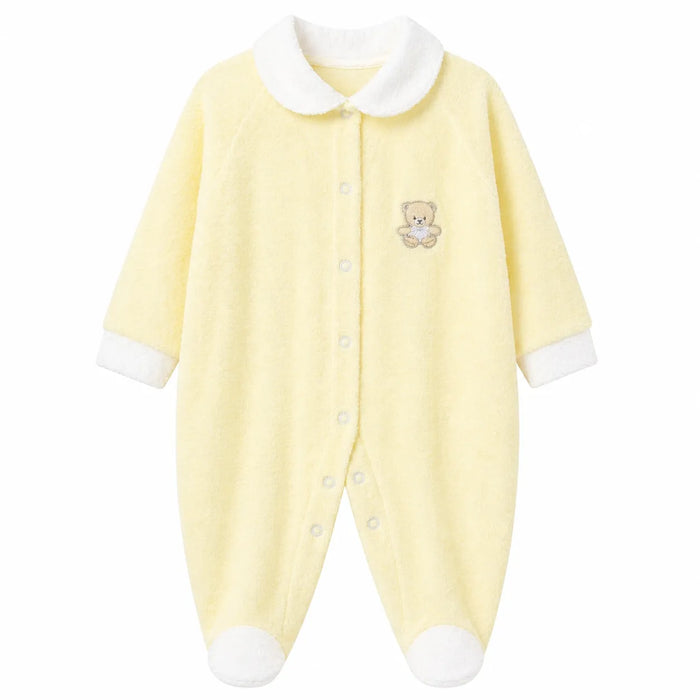 Baby pyjama yellow footed sleeper with teddy bear embroidery, displayed on white background.