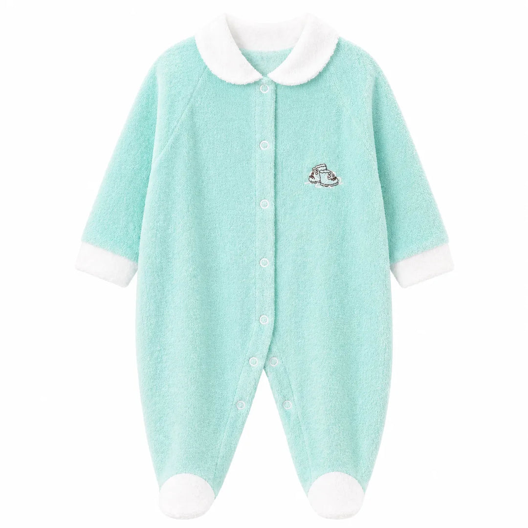Baby pyjama in light turquoise with white collar and cuffs, displayed flat on a white background.