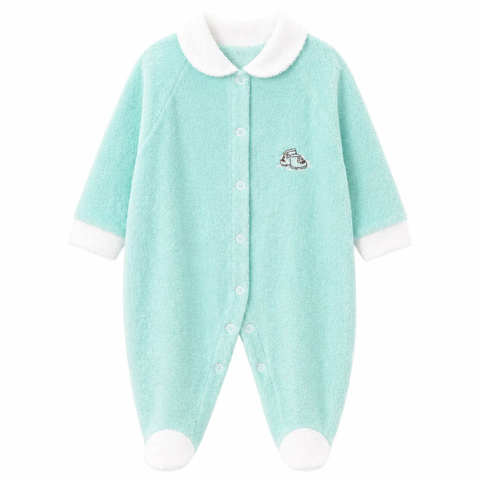 Baby pyjama in light turquoise with white collar and cuffs, displayed flat on a white background.