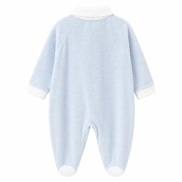 Light blue baby pyjama with white cuffs and collar shown flat on a white background.