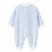 Light blue baby pyjama with white cuffs and collar shown flat on a white background.