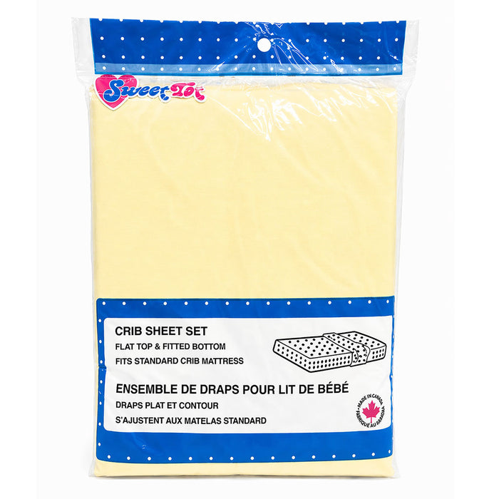 Yellow flannel crib sheet set in packaging, fits standard baby mattress, labeled Sweet Tot.
