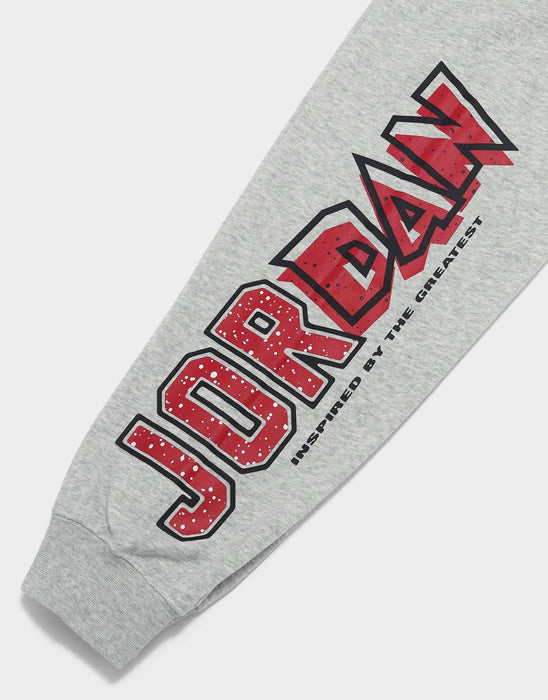 Jordan kids' grey sweatshirt sleeve with red and black graphic logo and ribbed cuff, laid flat.