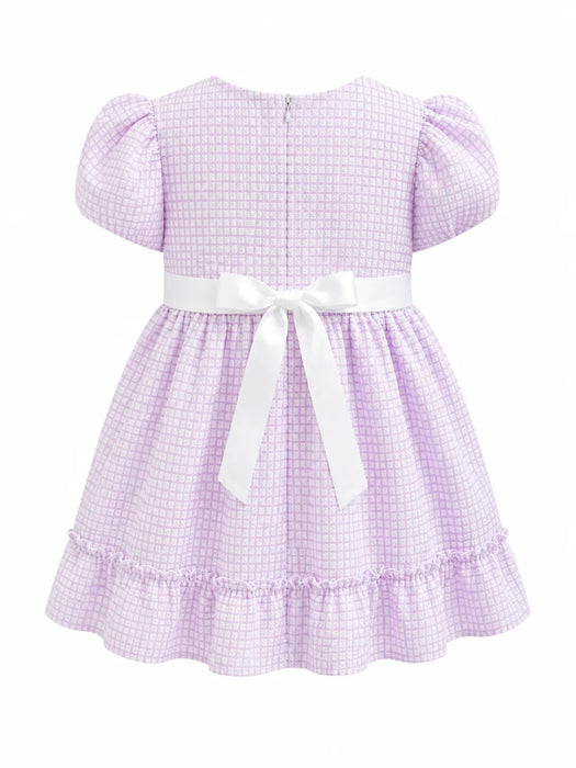 Kids Energy Floral Lilac Dress with puff sleeves, back zipper, and white bow, shown from the back.