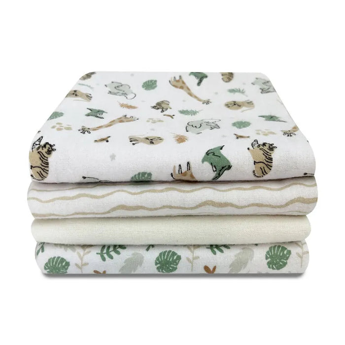 Koala Baby 4-Pack Flannel Receiving Blanket set neatly stacked, featuring safari and leaf patterns.