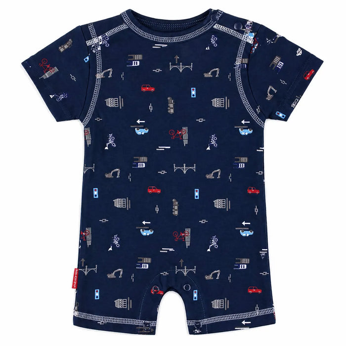 Kushies navy romper with short sleeves, road and vehicle pattern, laid flat on a white background.