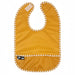 Orange waterproof baby bib with pocket and snap closure, white floral trim