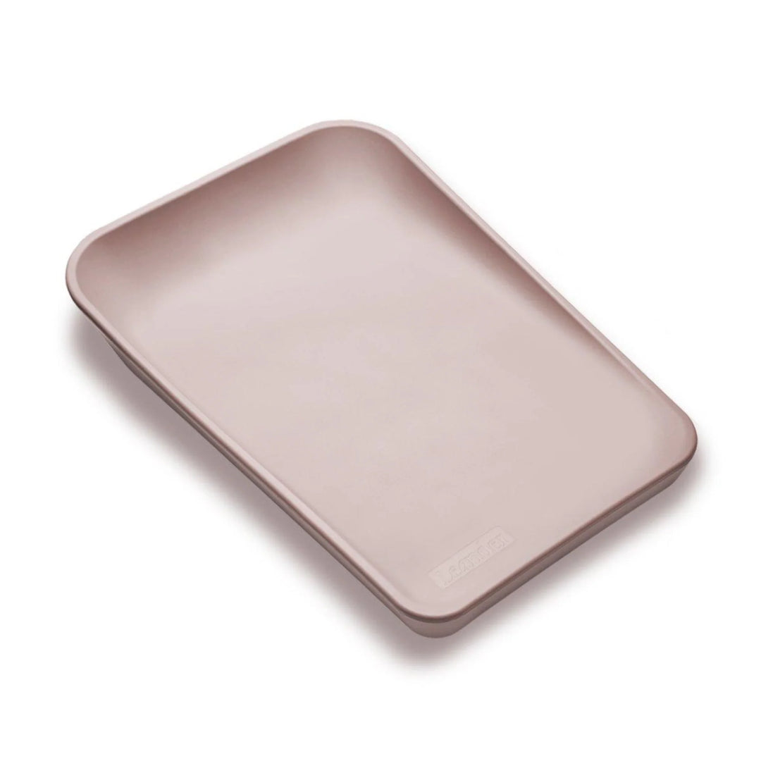 Leander Matty baby changing waterproof mat in soft pink shown on a white background.