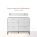 Little Seeds Laurel dresser topper shown above a white six-drawer dresser on a white background.