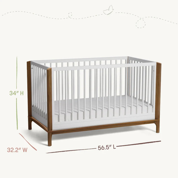 Little Seeds Laurel Island convertible crib in white and wood finish, shown with size measurements.