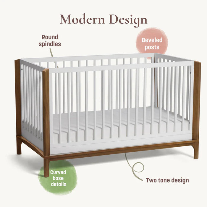 Little Seeds Laurel Island convertible crib with two-tone wood and white finish, shown in a modern design setting.