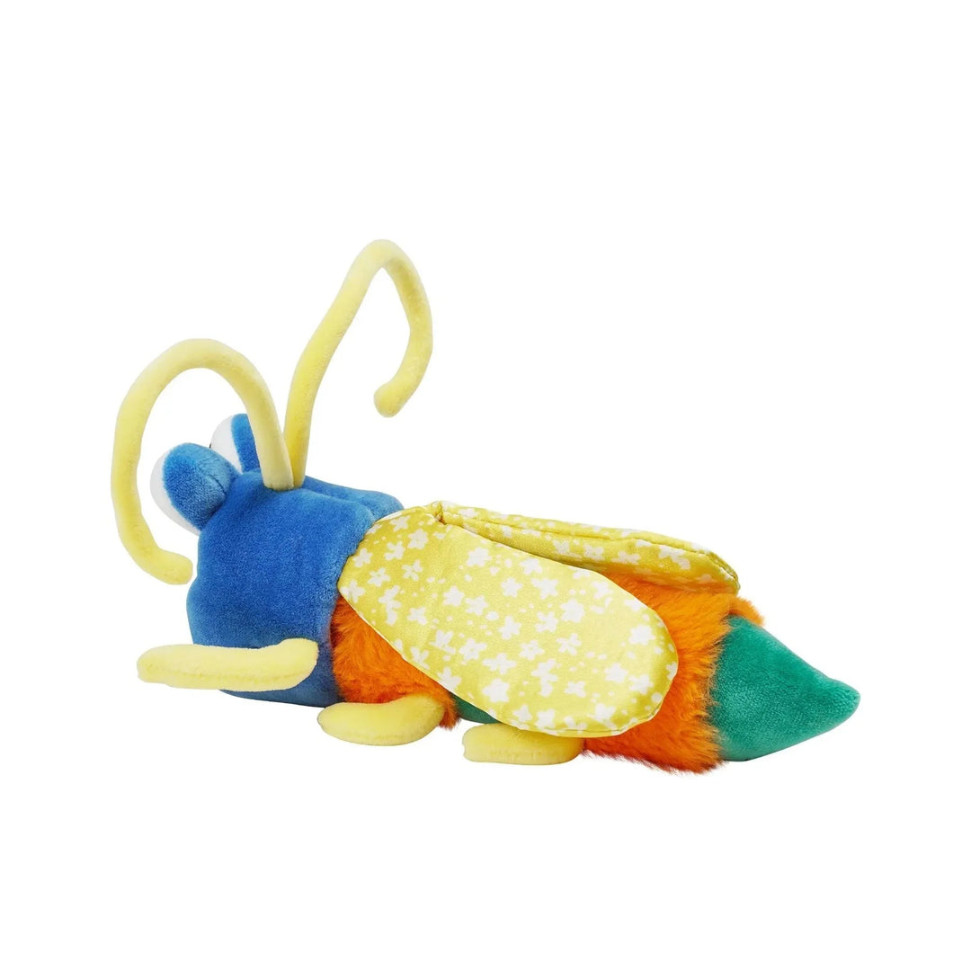 Manhattan Toy Flicker Flashlight Bug plush toy with blue, yellow, and green details on a white background.