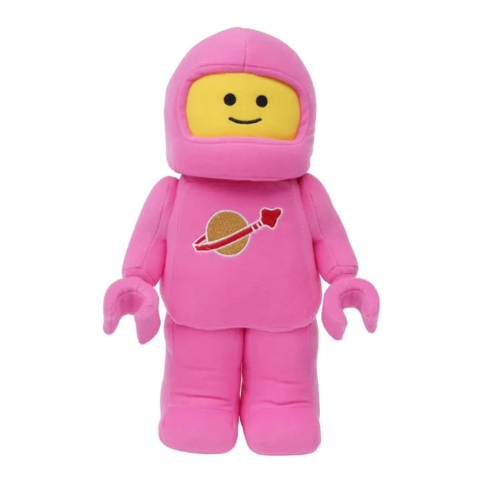 LEGO pink astronaut plush toy with embroidered space logo shown upright on a white background.