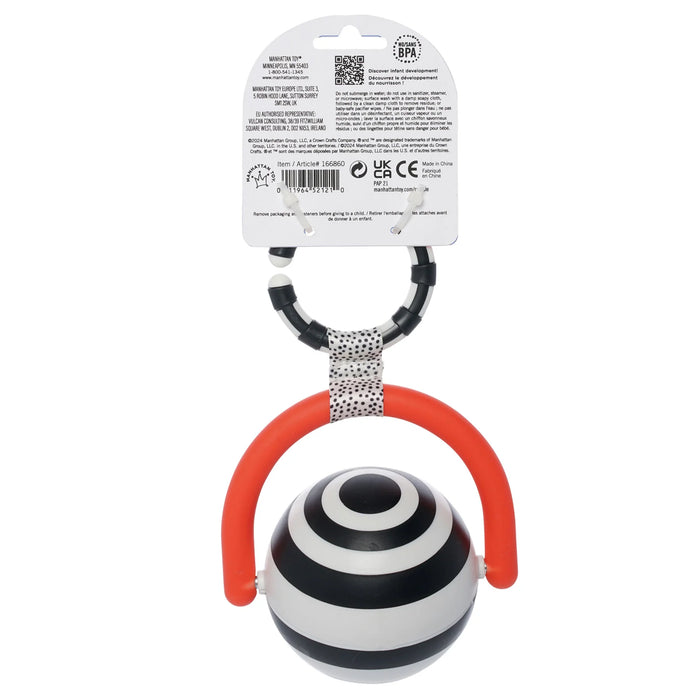 Manhattan Toy Wimmer Bullseye Ball baby toy with black and white rings and red arch, shown in packaging.