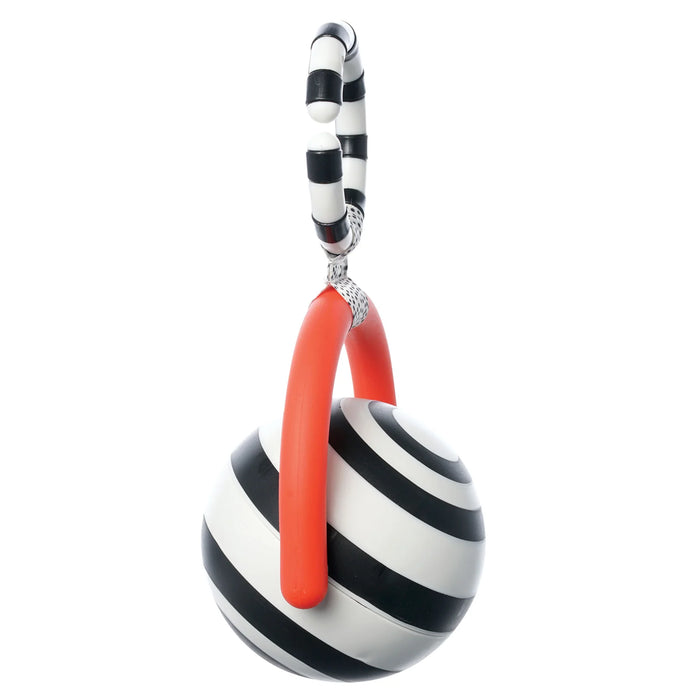 Manhattan Toy Wimmer Bullseye Ball black and white striped sensory toy with red handle against white background.