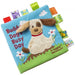 Taggies Soft Book Teddy Dog shown closed with colorful ribbon tags and an embroidered dog on the cover.