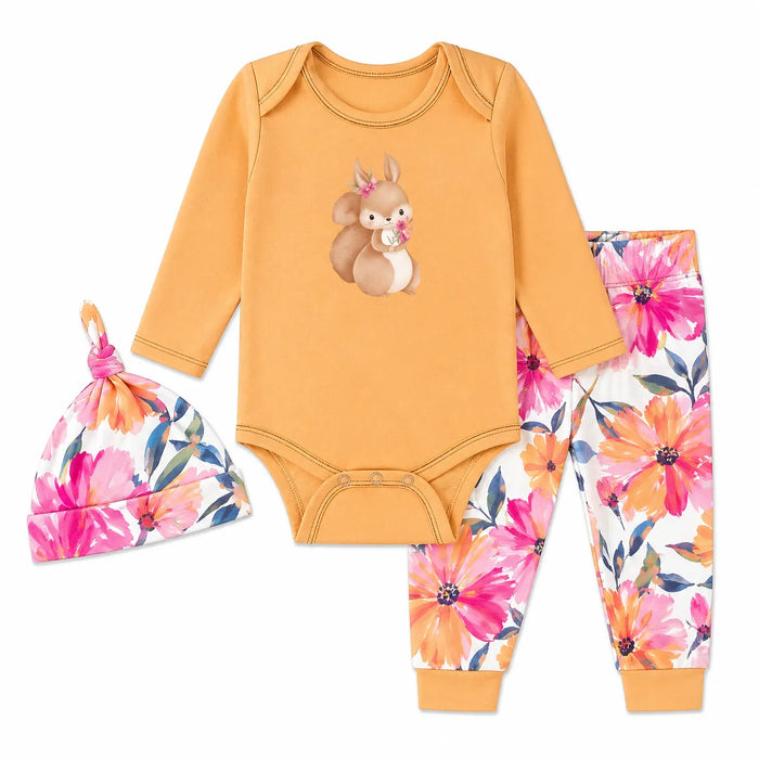 Three-piece baby set with yellow squirrel bodysuit, floral pants, and matching floral hat laid flat.