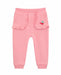 Mid Baby Cherry Blossom Comfort Pants in pink with ruffle pockets and cherry embroidery, laid flat.