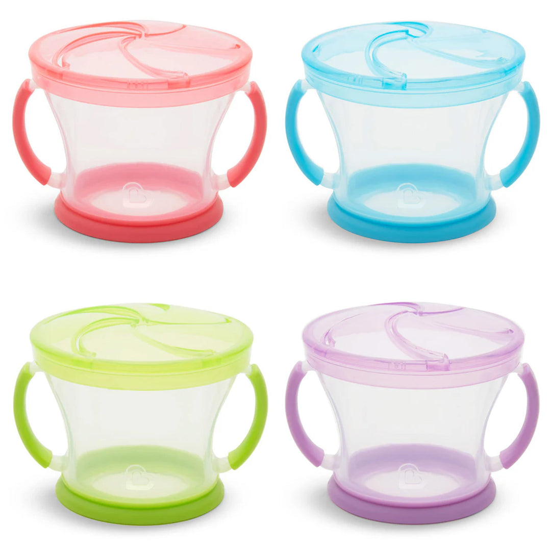 Munchkin Snack Catcher plastic cups in four bright colors, shown side by side on a white background.