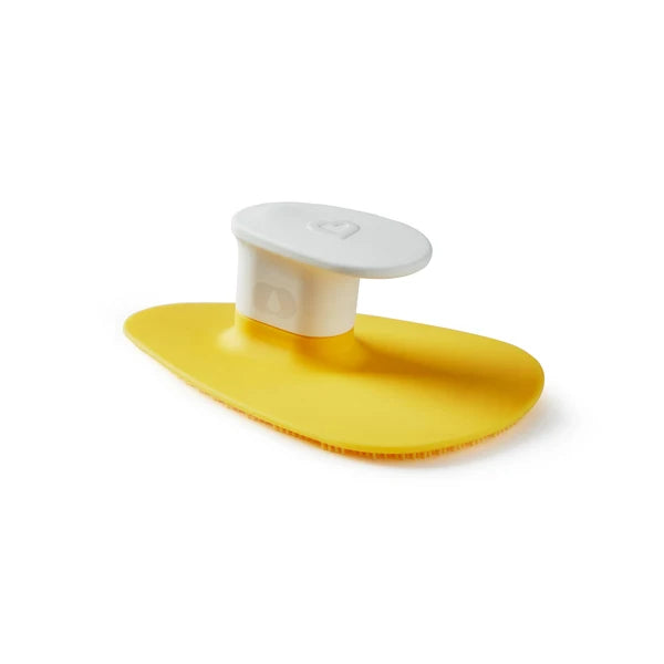 Brosse de bain en silicone Munchkin® Squeeze & Scrub avec distributeur de savon