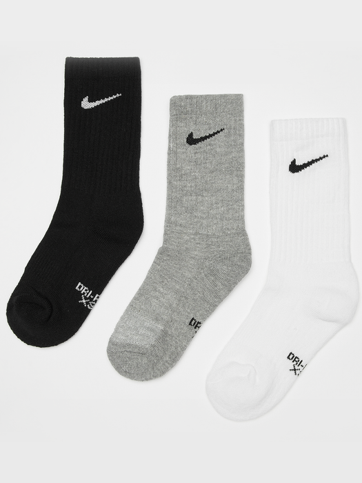 Nike Dri-FIT cushioned crew socks in black, grey, and white laid out side by side on a white background.