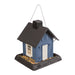 Blue cottage-shaped bird feeder with black roof and white door, filled with birdseed