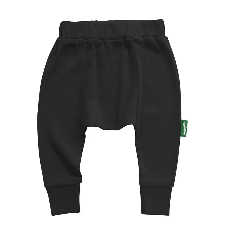 Parade Organics cotton baby harem pants in black shown flat against a white background.