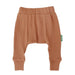 Parade Organics cotton baby harem pants in brown color laid flat on a white background.